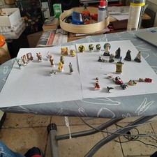 lot de fèves star wars, astérix, looney, marsupilami, ....