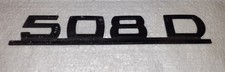 508 D, PLAQUE ARRIERE MODELE DU VEHICULE COULEUR NOIRE