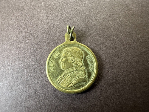 Petite médaille laiton de - en,