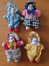 Lot de 4 poupées clowns tête