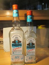 2 bouteilles vides Floranis, anisette gras, 70cl, et 1 L.