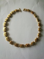Collier doré à strass