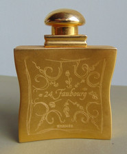 HERMÈS flacon de sac, doré en métal avec recharge vide - 24 Faubourg (Vintage)