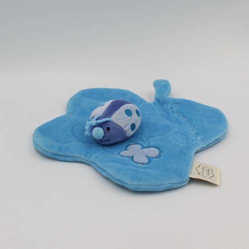 Doudou plat coccinelle sur