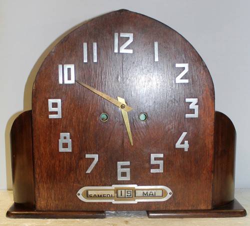 Pendule calendrier à - ,