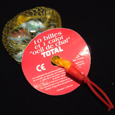 Filet de 10 billes et 1 calot publicitaires œil de chat TOTAL Taïwan vintage