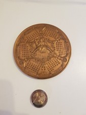 medaille en bronze calendrier