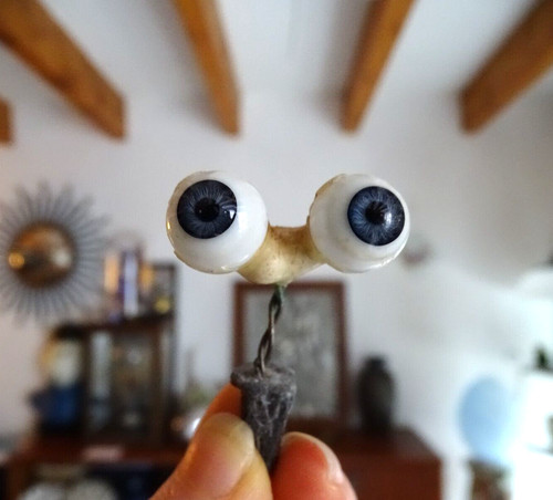Yeux bleus poupée anciens