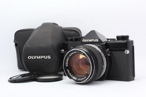 Olympus film camera - md,
