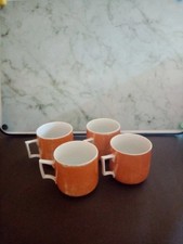 4 tasses à café orange avec petit liseret doré, 6 cm de diamètre et 5 cm de haut