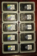 Cartouches CANON 5x540XL et 5x541XL vides avec leur étui.