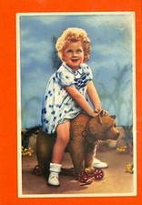 CPA FANTAISIE " JEUNE FILLE SUR SON OURS A ROULETTES " 