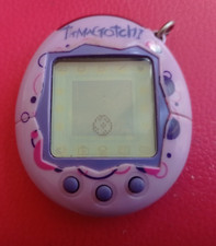 Tamagotchi - Bandai 2004 Tamagotchi Fonctionnel, mauve.