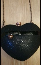 Joli Petit Sac a Main Noir Marque Lollipops en très bon état.