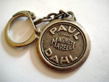 PORTE CLES PUB PAUL DAHL AFCO DAKAR ABIDJAN LICENCE MAGNETI MARELLI