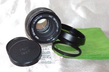 RARE objectif M42 50mm f1,9 ZENITAR bouchons, filtre, pare-soleil et housse TBE