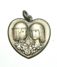 joli pendentif en argent