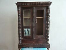 Armoire de poupée ancienne plaquage palissandre.