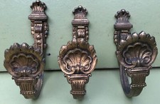 3 PORTE EMBRASSE POUR CORDON DE RIDEAUX. LAITON ET BRONZE STYLISÉ COQUILLE 