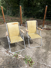 2 chaises de camping 1960-70  qui fonctionne très bien & un peu usées