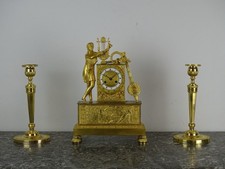 Pendule en bronze doré -