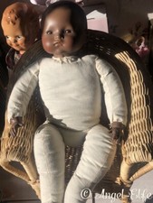 Petit poupon noir de 36 cm