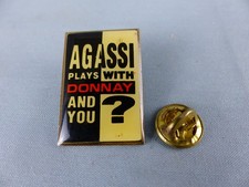 PIN'S ANDRE AGASSI plays with