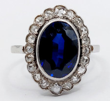 Bague marguerite antique Platine saphir synthétique et diamants (circa 1910)