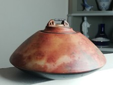 Pot à épice ancien en terre