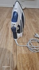 Fer à repasser moderne en bon état à vendre pour cause de déménagement