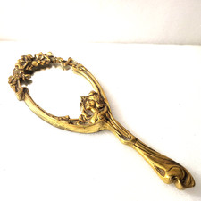 Miroir à main en bronze, Art