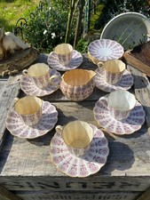 6 Tasses, 11 sous tasses et un pot à crème Sarreguemines Minton XIXème