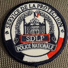 ECUSSON POLICE NATIONALE SERVICE DE LA PROTECTION SDLP  (ÉCU 85) VOIR PHOTOS