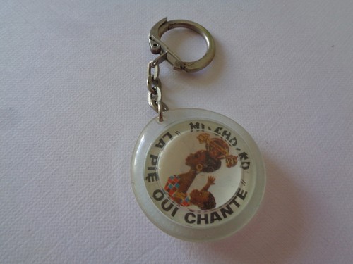 Ancien porte cle - porte, pie