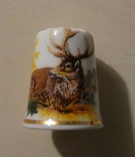 1 dé à coudre en porcelaine   -   Le Cerf