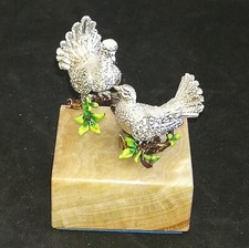 Couple de pigeons en argent