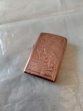 Briquet à essence en bronze