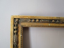 Cadre ancien en bois sculpté