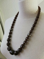 collier ancien de couleur marron, bakélite