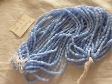 lot 1200 perles anciennes en verre bleu pastel  grain de riz idéal broderie