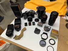 Appareil photo reflex Minolta Maxxum 7000i en parfait état avec accessoires