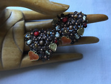 Boucles d’oreilles clips couleur bronze Gas St Tropez forme cœur en très bon ét.