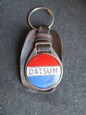 PORTE CLE (KEY RING)METAL SUR CUIR DATSUN