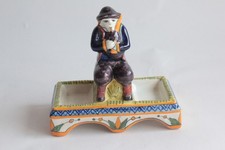 Saleron faïence Joueur de