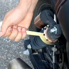 Clé de réglage à ressort