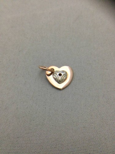 Collier pendentif cœur trou