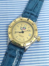 Montre pour femme TAG Heuer Professional 200 Quartz 964,008 lunette dorée en ...