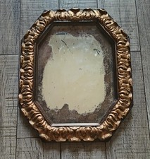 Ancien miroir octogonal en bois doré avec glace au mercure 53 x 43cm