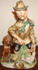 ANTIQUE MAN w/ DOG CERAMIC