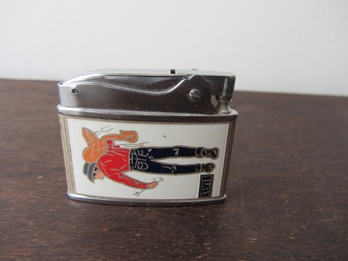 Briquet essence - à,